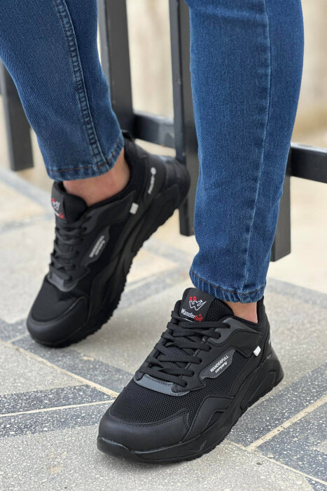 ATLETE ME LIDHËSE PËR MESHKUJ NË NGJYRËN E ZEZË 