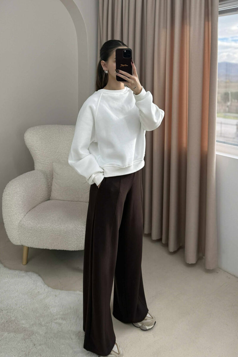 BLUZE ME PUSH E THJESHTE NJE NGJYRESHE PER FEMRA NE NGJYRE TE BARDHE - 1