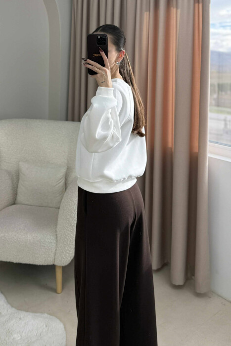 BLUZE ME PUSH E THJESHTE NJE NGJYRESHE PER FEMRA NE NGJYRE TE BARDHE - 2