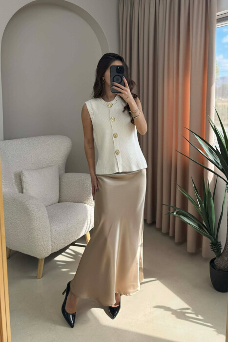 JELEK NJË NGJYRËSH ME DETAJIN E BUTONAVE PËR FEMRA NË NGJYRË KREM - KLAUDIO FASHION