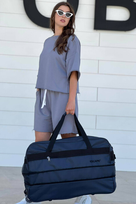 ÇANTË UDHËTIMI ME DOREZË DHE RROTA NË NGJYRËN BLU TË ERRËT - 4