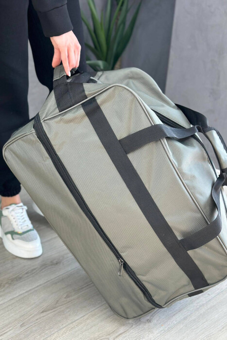 ÇANTË UDHËTIMI ME DOREZË DHE RROTA NË NGJYRËN JESHILE - KLAUDIO FASHION