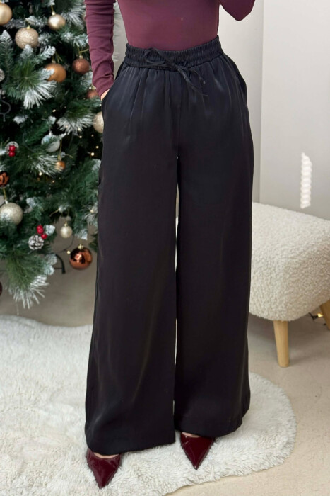 PANATLLONA ME SHKËLQIM ME LIDHËSE DHE BEL ELASTIK PËR FEMRA NË NGJYRË TË ZEZË 