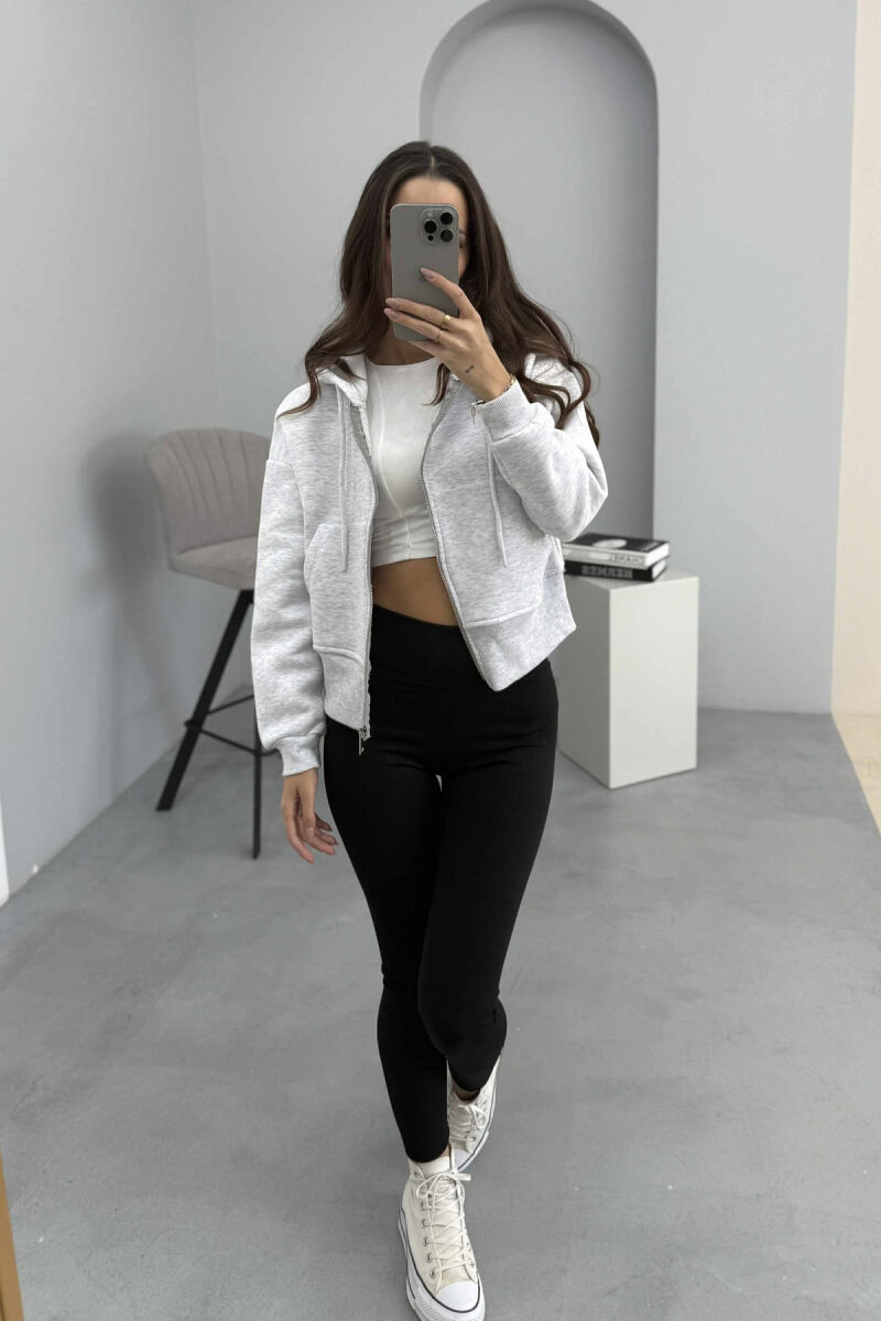 HOODIE ME ZINXHIR DHE ME PUSH NJË NGJYRËSHE PËR FEMRA NË NGJYRËN GRI TË ZBARDHUR - 1