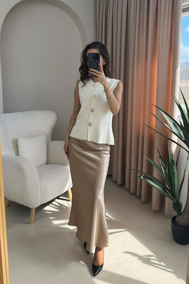 JELEK NJË NGJYRËSH ME DETAJIN E BUTONAVE PËR FEMRA NË NGJYRË KREM - 2