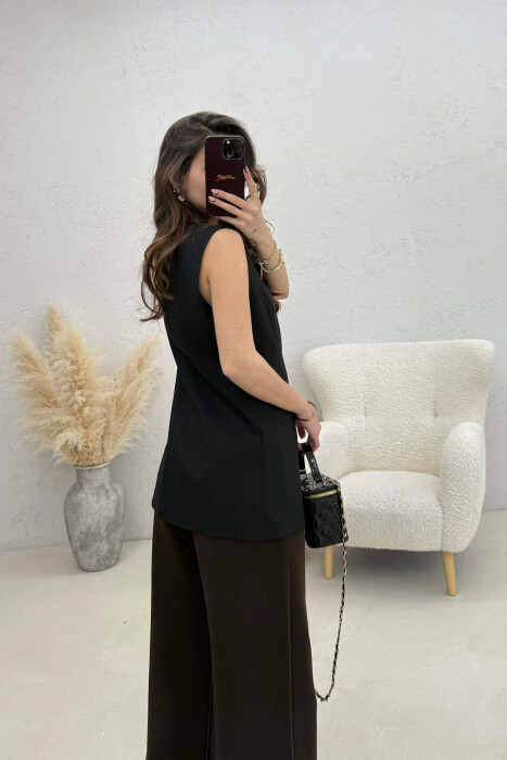 JELEK NJE NGJYRESH ME JAKE RRETHORE PER FEMRA NE NGJYRE TE ZEZE - 2