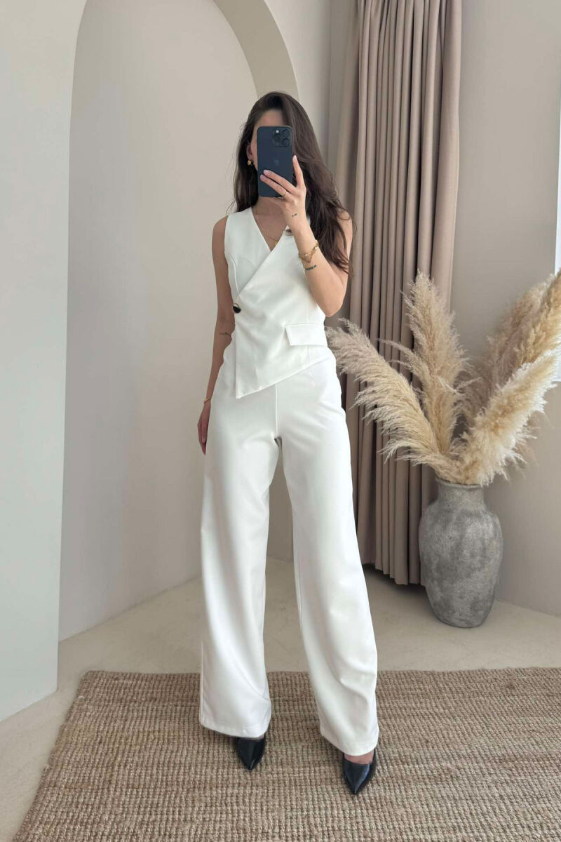 JUMPSUIT NJË NGJYRËSH I THJESHTË PËR FEMRA NË NGJYRËN E BARDHË - 1
