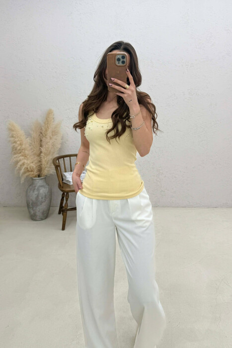 KANATIERE ME DETAJE PERLASH PER FEMRA NE NGJYRE TE VERDHE - 3