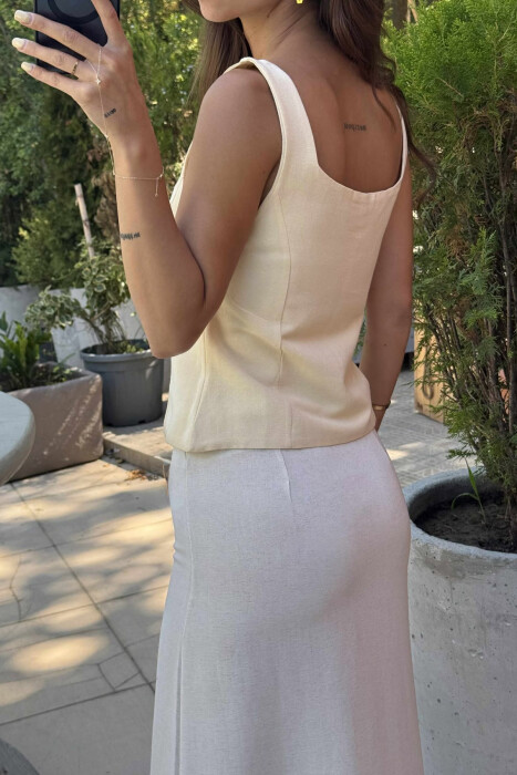 KANATIERE NJË NGJYRËSHE ME BUTONA PËR FEMRA NË NGJYRËN E VERDHË - 4