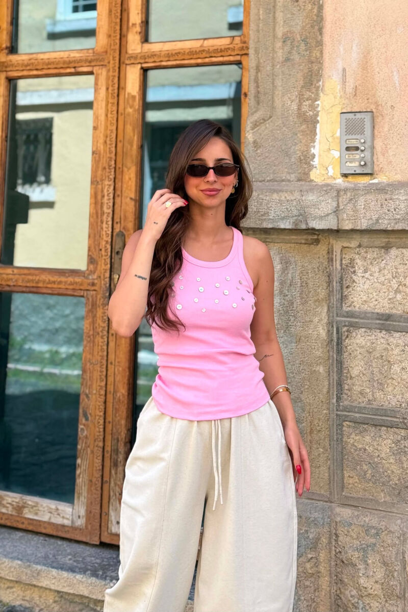 KANATJERE NJE NGJYRESHE ME DETAJIN E BUTONAVE PER FEMRA NE NGJYRE ROZE - 1