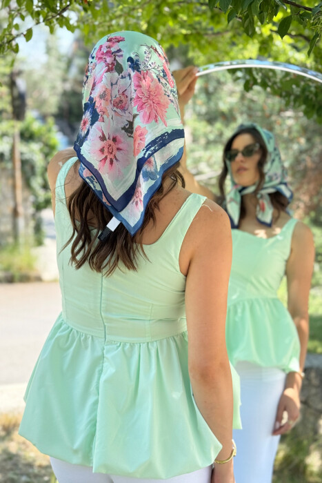 KANATJERE NJË NGJYRËSHE PËR FEMRA NË NGJYRËN JESHILE E ZBARDHUR - 2