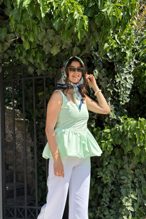 KANATJERE NJË NGJYRËSHE PËR FEMRA NË NGJYRËN JESHILE E ZBARDHUR - 5