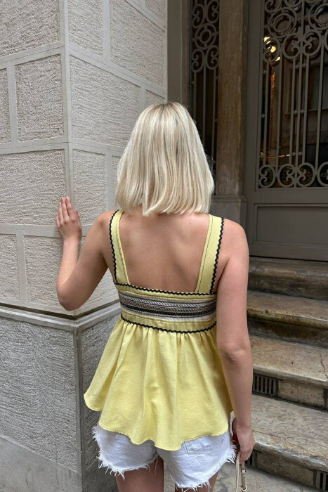 KANATJERE PËR FEMRA NË NGJYRËN E VERDHË - 5