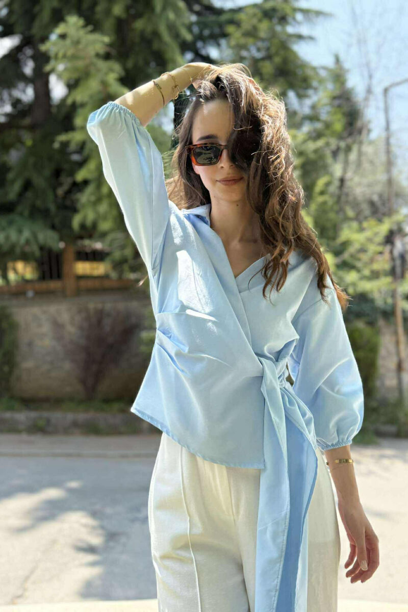 KËMISHE NJË NGJYRËSHE ME LIDHSE PËR FEMRA NË NGJYRËN BLU E ZBARDHUR - 6