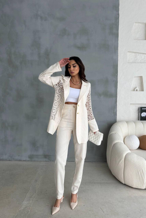 KOSTUM LINO ME DETAJE PËR FEMRA NË NGJYRËN KREM - 1