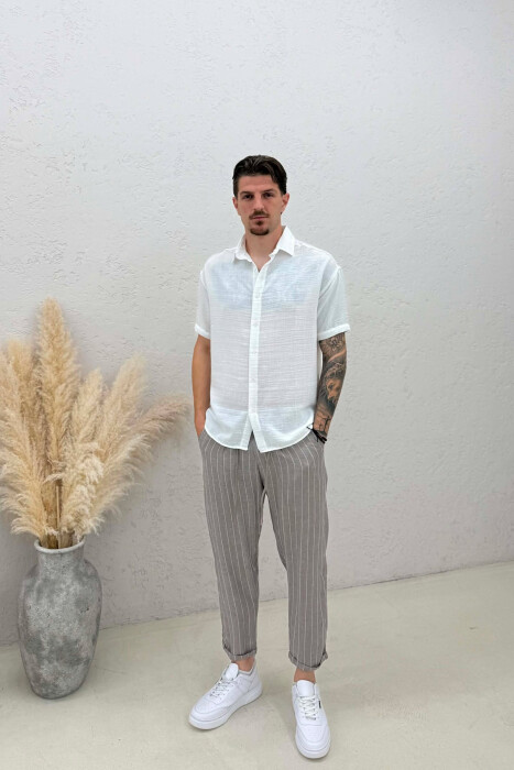 PANTALLONA ME DIZAJN VIJASH DHE ME LIDHESE TEK BELI PER MESHKUJ NE NGJYRE KAFE TE ZBARDHUR - KLAUDIO FASHION