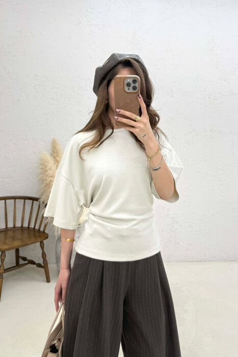 BLUZE NJE NGJYRESHE ME DETAJIN E LIDHSEVE PER FEMRA NE NGJYRE TE BARDHE ANTIKE 