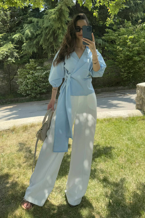 KËMISHE NJË NGJYRËSHE ME LIDHSE PËR FEMRA NË NGJYRËN BLU E ZBARDHUR - KLAUDIO FASHION