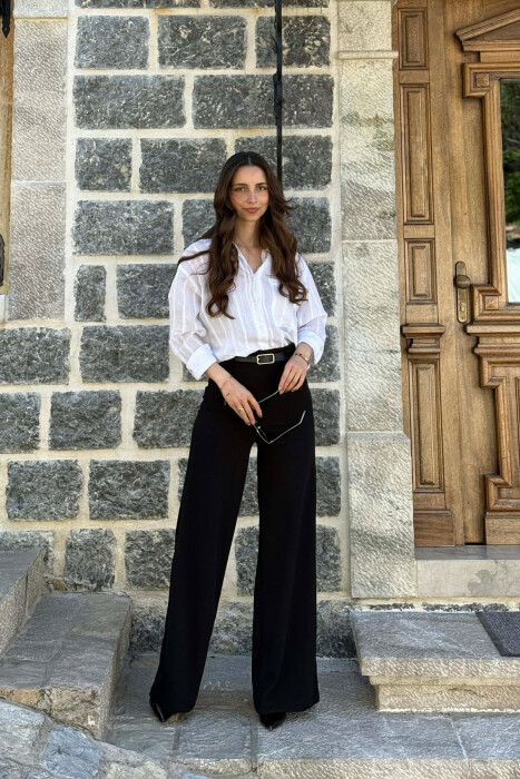 PANTALLONA TE GJERA NJE NGJYRESHE ME DETAJIN E RRIPIT PER FEMRA NE NGJYRE TE ZEZE - KLAUDIO FASHION