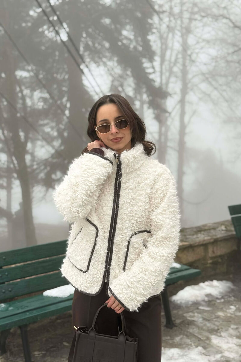 PALLTO NJE NGJYRESHE ME GEZOF DHE XHEPA NE PJESEN PARA PER FEMRA NE NGJYRE TE BARDHE - 1