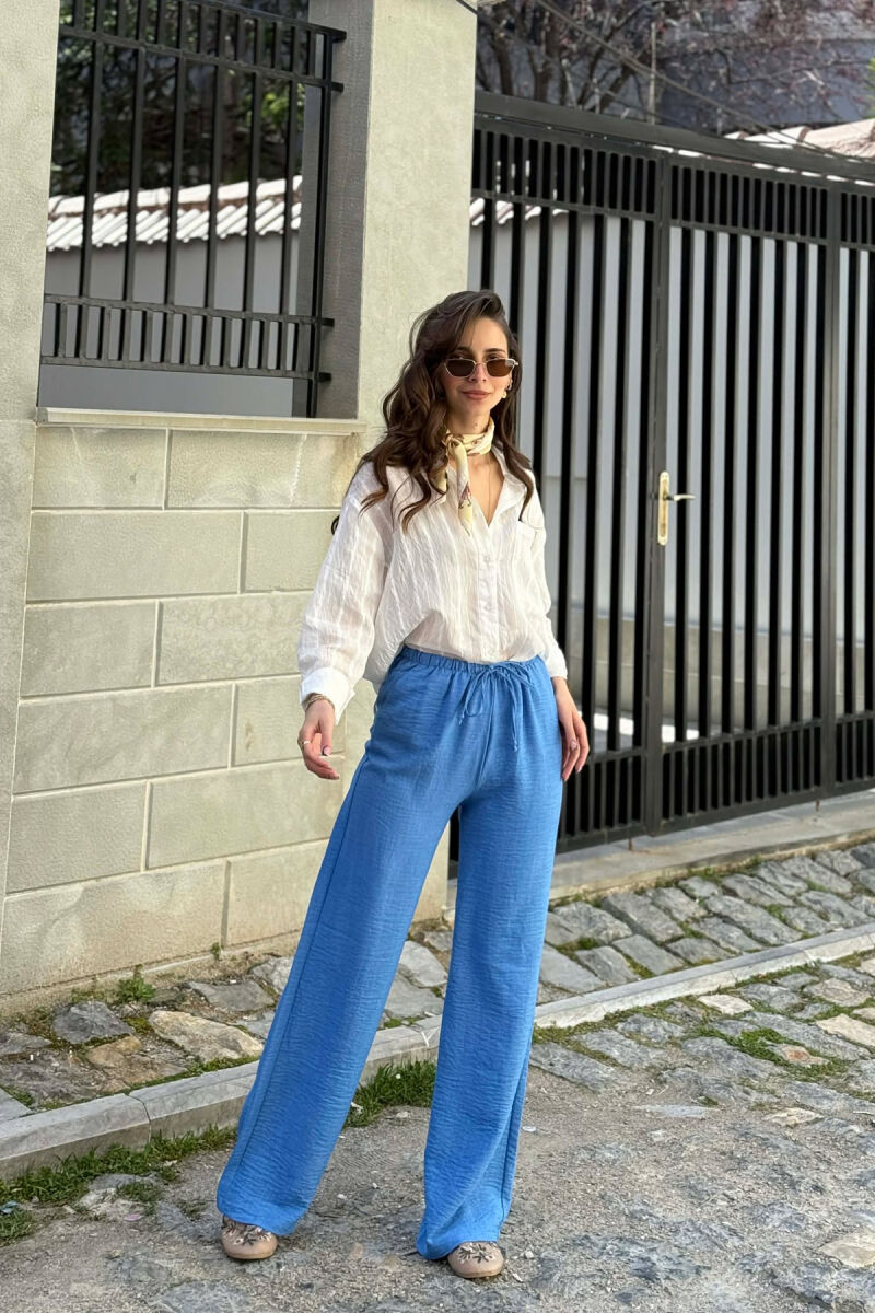 PANTALLONA ME BEL ELASTIK DHE ME DETAJIN E LIDHSEVE PER FEMRA NE NGJYRE BLU TE ZBARDHUR - 5