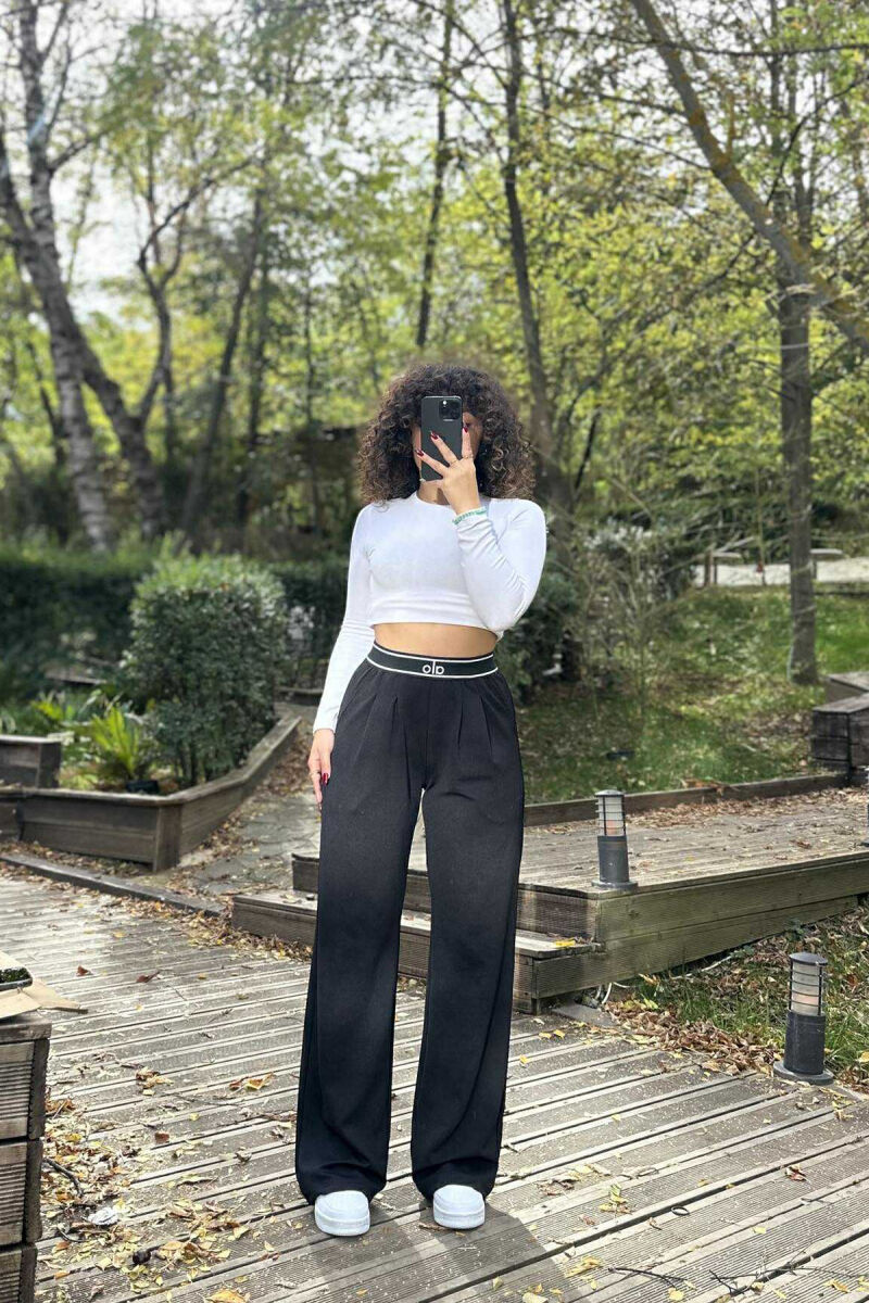 PANTALLONA ME SHKRIM ALO ME BEL ELASTIK PËR FEMRA NË NGJYRË TË ZEZË - 2