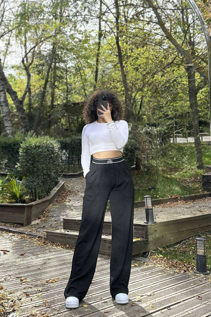 PANTALLONA ME SHKRIM ALO ME BEL ELASTIK PËR FEMRA NË NGJYRË TË ZEZË - 3