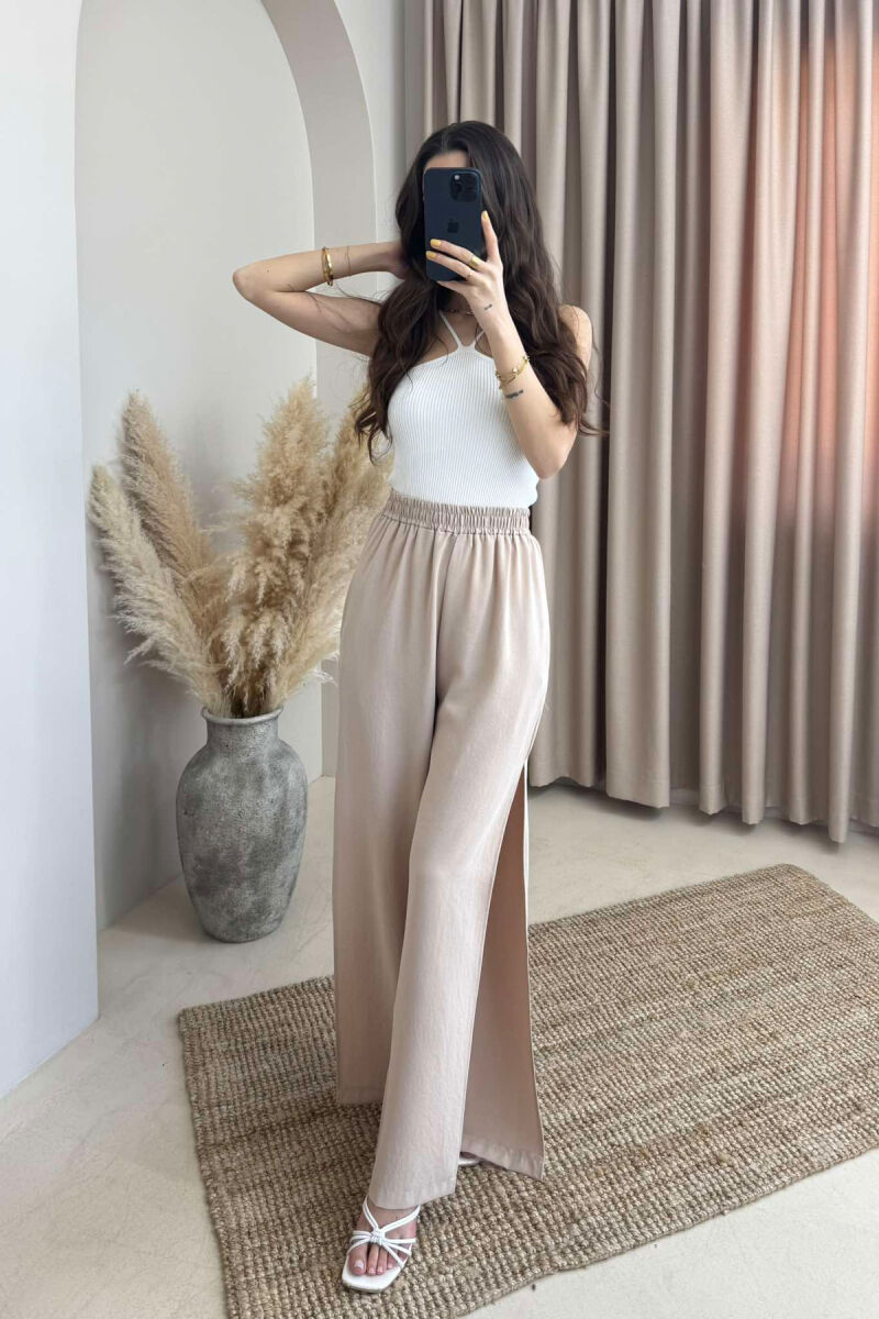 PANTALLONA NJË NGJYRËSHE TË GJERA PËR FEMRA NË NGJYRËN BEZHË - 2