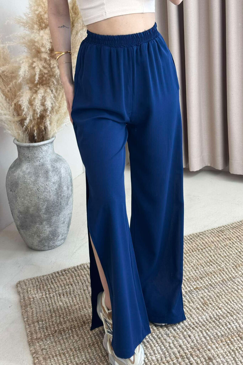 PANTALLONA NJË NGJYRËSHE TË GJERA PËR FEMRA NË NGJYRËN BLU E ERRËT - 2