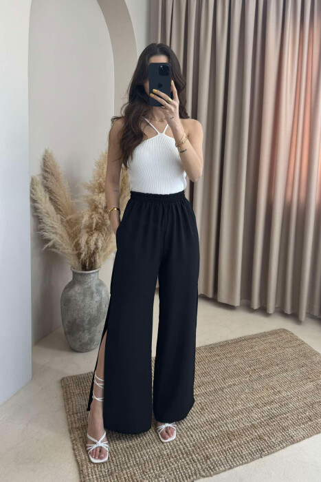 PANTALLONA NJË NGJYRËSHE TË GJERA PËR FEMRA NË NGJYRËN E ZEZË - 2