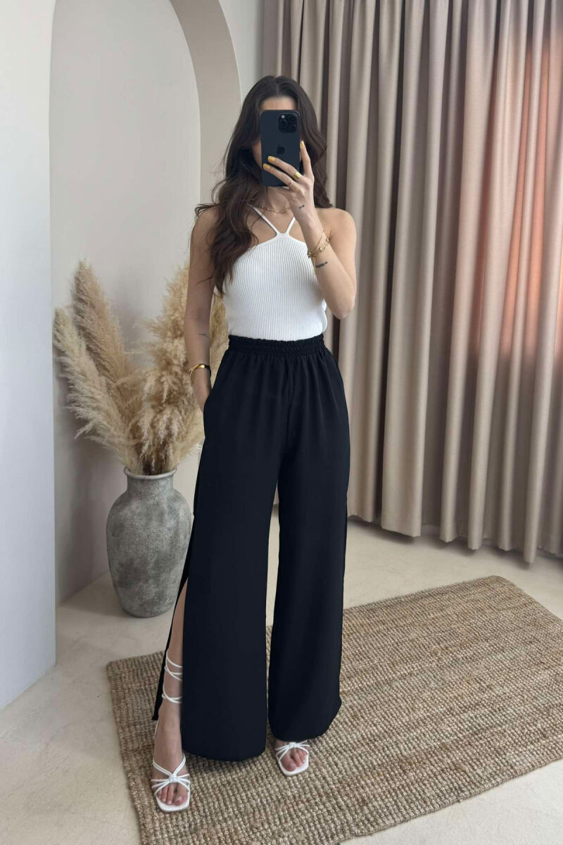 PANTALLONA NJË NGJYRËSHE TË GJERA PËR FEMRA NË NGJYRËN E ZEZË - 2