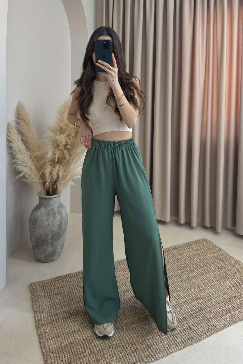 PANTALLONA NJË NGJYRËSHE TË GJERA PËR FEMRA NË NGJYRËN JESHILE - 1