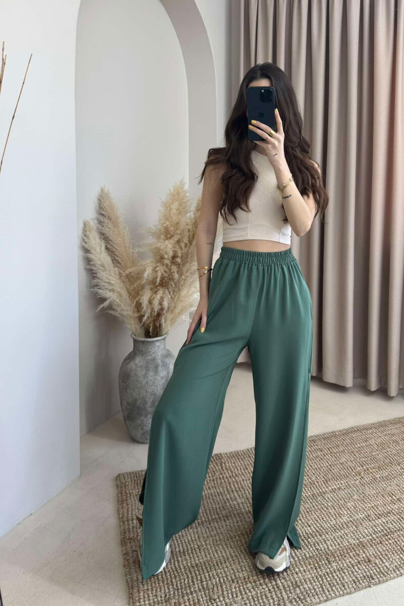 PANTALLONA NJË NGJYRËSHE TË GJERA PËR FEMRA NË NGJYRËN JESHILE - 2