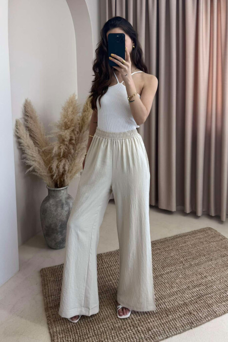 PANTALLONA NJË NGJYRËSHE TË GJERA PËR FEMRA NË NGJYRËN KREM - 5