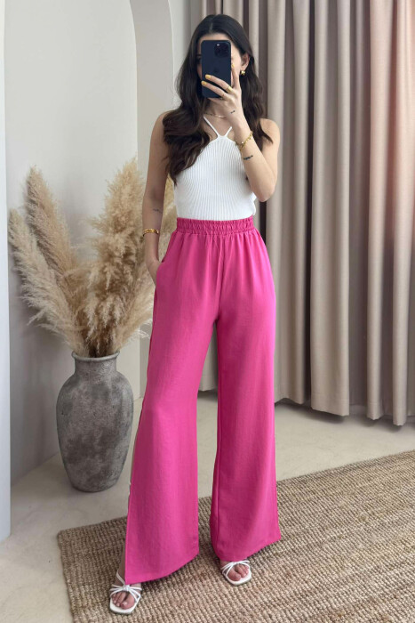 PANTALLONA NJË NGJYRËSHE TË GJERA PËR FEMRA NË NGJYRËN ROZË - 2