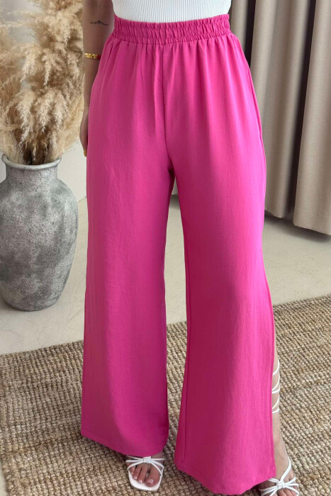 PANTALLONA NJË NGJYRËSHE TË GJERA PËR FEMRA NË NGJYRËN ROZË - 3