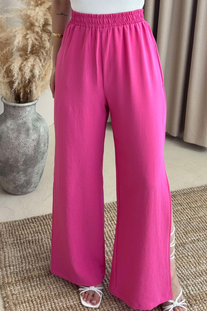 PANTALLONA NJË NGJYRËSHE TË GJERA PËR FEMRA NË NGJYRËN ROZË - 3