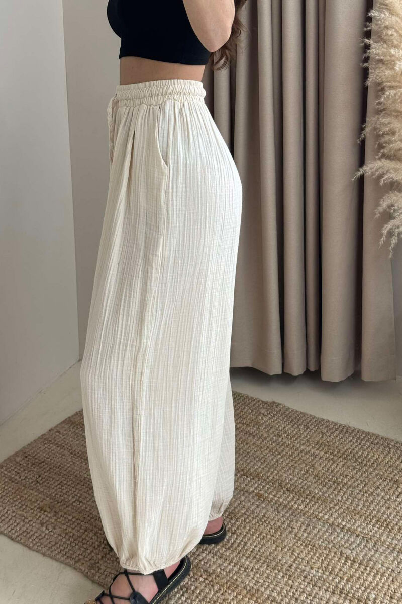 PANTALLONA NJË NGJYRËSHE TË THJESHTA PËR FEMRA NË NGJYRËN BEZHË - 4