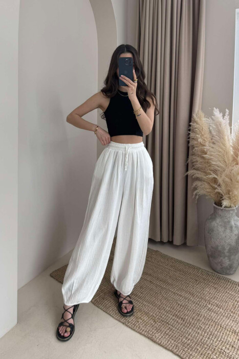 PANTALLONA NJË NGJYRËSHE TË THJESHTA PËR FEMRA NË NGJYRËN E BARDHË - KLAUDIO FASHION