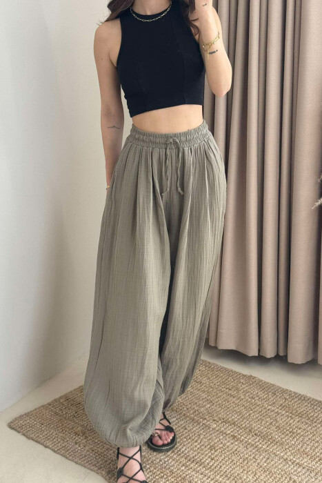 PANTALLONA NJË NGJYRËSHE TË THJESHTA PËR FEMRA NË NGJYRËN JESHILE - 3