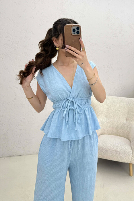 SET NJE NGJYRESH KANATJERE + PANTALLONA PER FEMRA NE NGJYRE BLU TE ZBARDHUR - 4