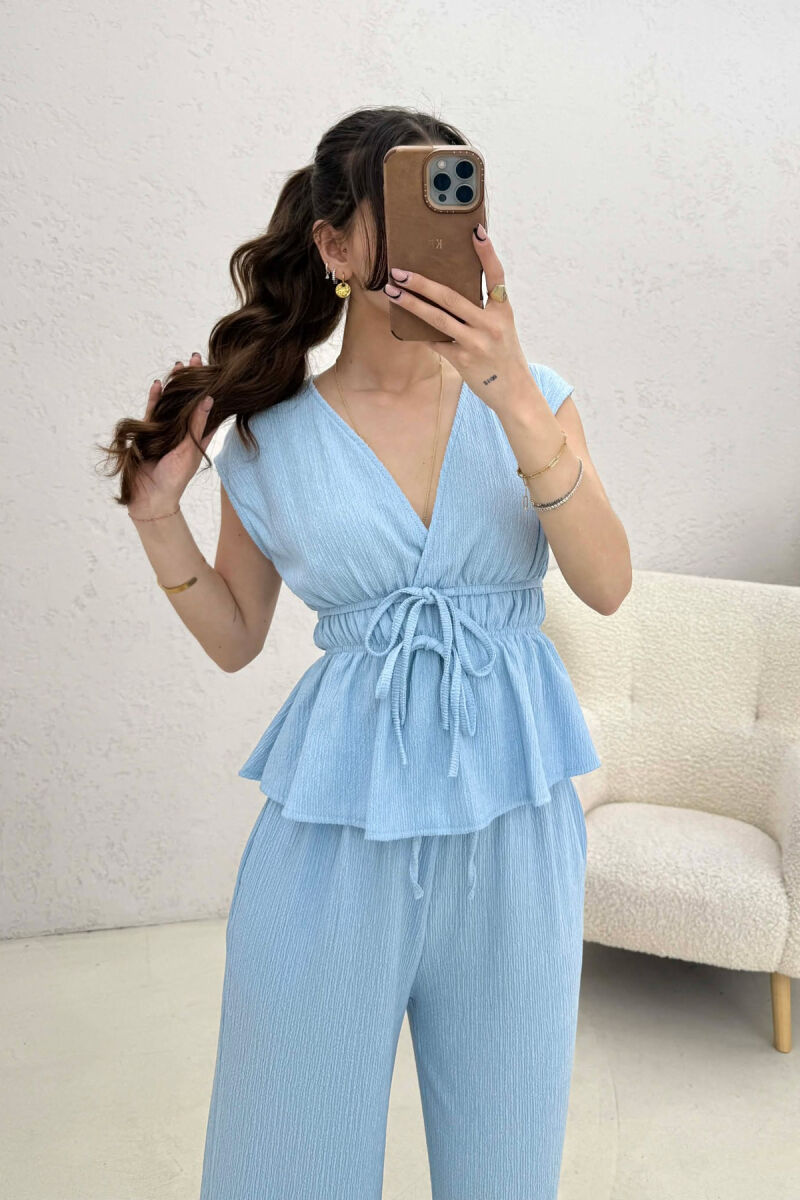 SET NJE NGJYRESH KANATJERE + PANTALLONA PER FEMRA NE NGJYRE BLU TE ZBARDHUR - 4