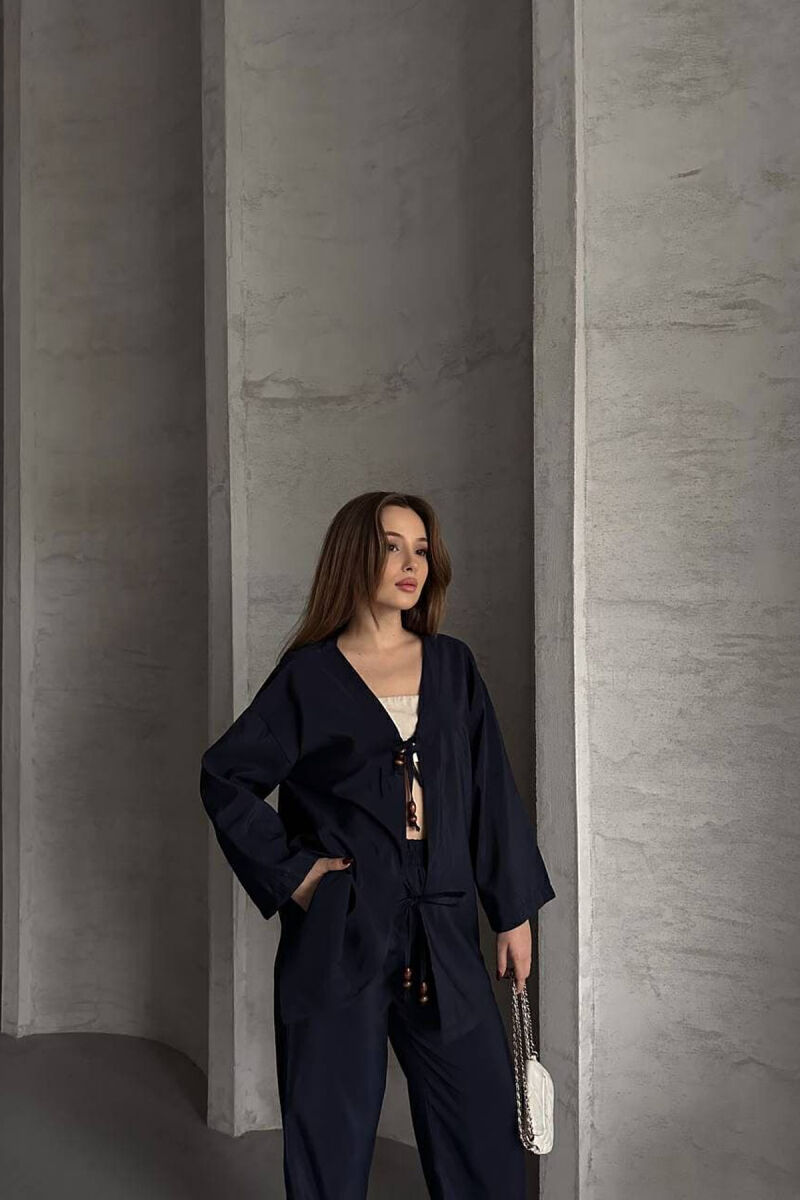 SET NJË NGJYRËSH ME DETAJIN E LIDHSEVE PANTALLONA+KËMISHË PËR FEMRA NË NGJYRËN BLU - 2