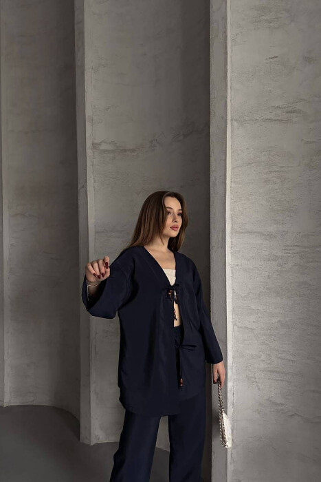 SET NJË NGJYRËSH ME DETAJIN E LIDHSEVE PANTALLONA+KËMISHË PËR FEMRA NË NGJYRËN BLU - 3