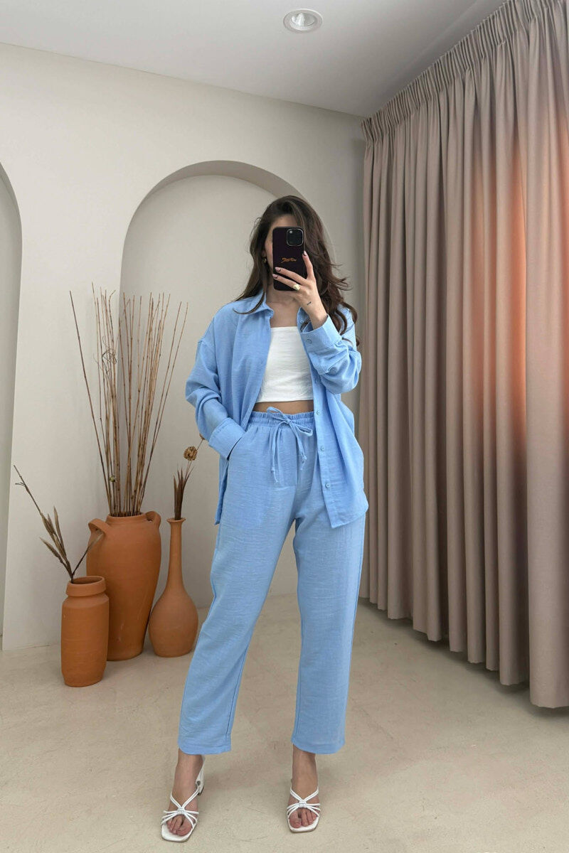 SET NJE NGJYRESH KEMISHE + PANTALLONA ME LIDHESE PER FEMRA NE NGJYRE BLU TE ZBARDHUR - 1