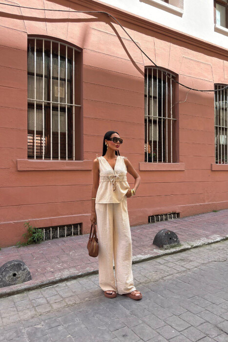 SET NJË NGJYRËSH KANATIERE+PANTALLONA PËR FEMRA NË NGJYRË BEZHË - 1