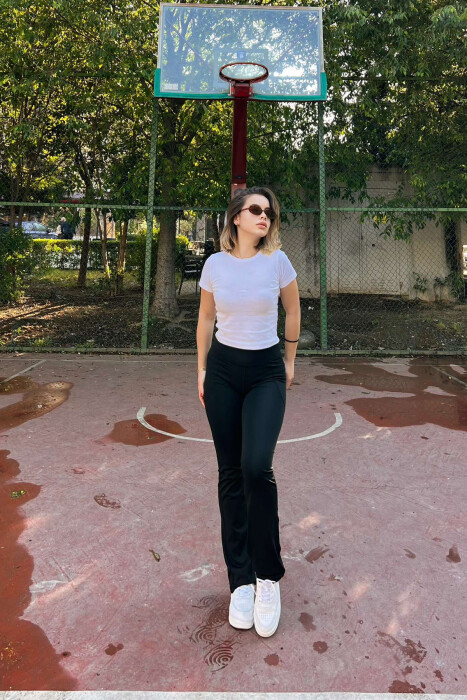 STREÇE TË GJËRA ME DETAJIN E XHEPAVE PËR FEMRA NË NGJYRËN E ZEZË - 4