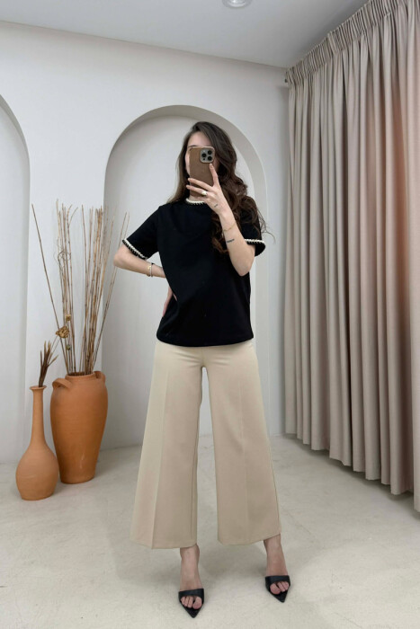 T-SHIRT NJE NGJYRESH ME DETAJ TEK QAFA PER FEMRA NE NGJYRE TE ZEZE - 2