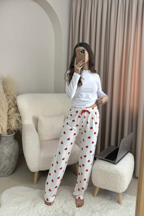 TUTA ME DIZAJN ME ZEMRA DHE ME DETAJIN E FJONGOS PER FEMRA NE NGJYRE TE BARDHE - KLAUDIO FASHION