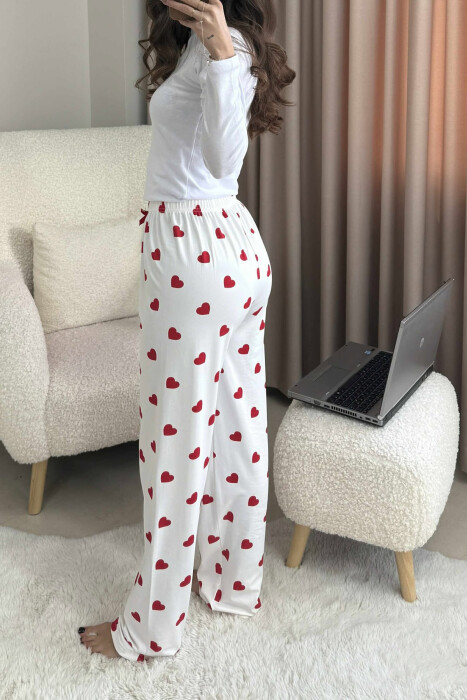 TUTA ME DIZAJN ME ZEMRA DHE ME DETAJIN E FJONGOS PER FEMRA NE NGJYRE TE BARDHE - 4